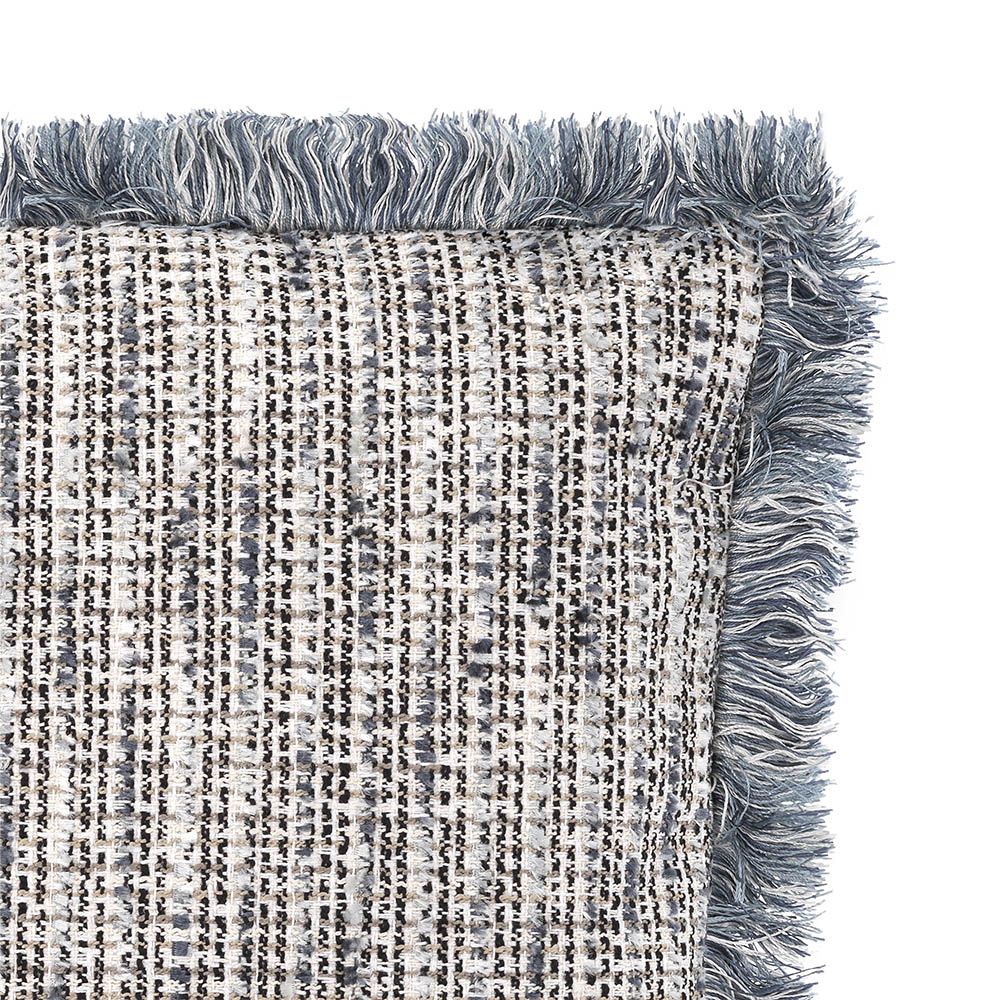 A luxury blue cushion by Eichholtz with fringing