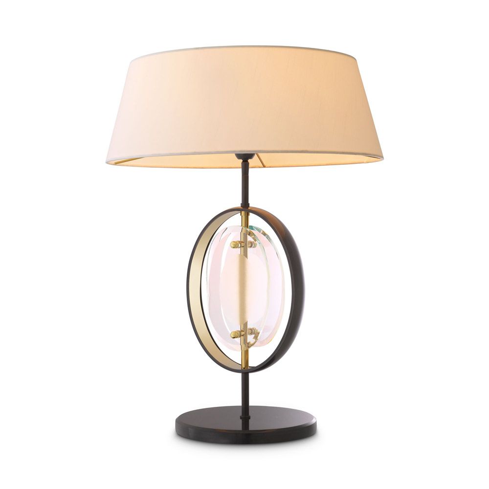 An elegant table lamp by Eichholtz with a honed marble base and gunmetal finish 