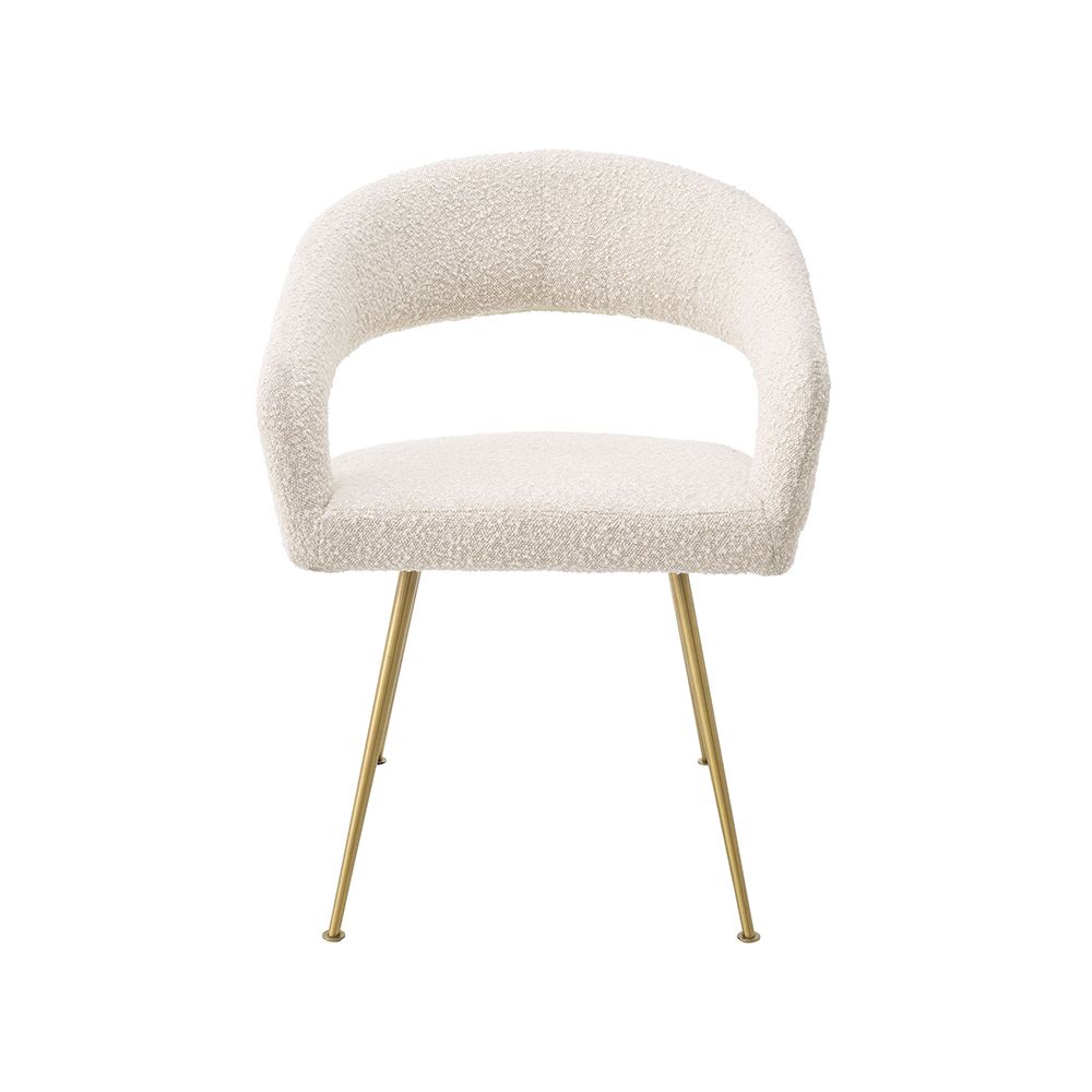 A glamorous dining chair in a range of finishes with brass tapered legs