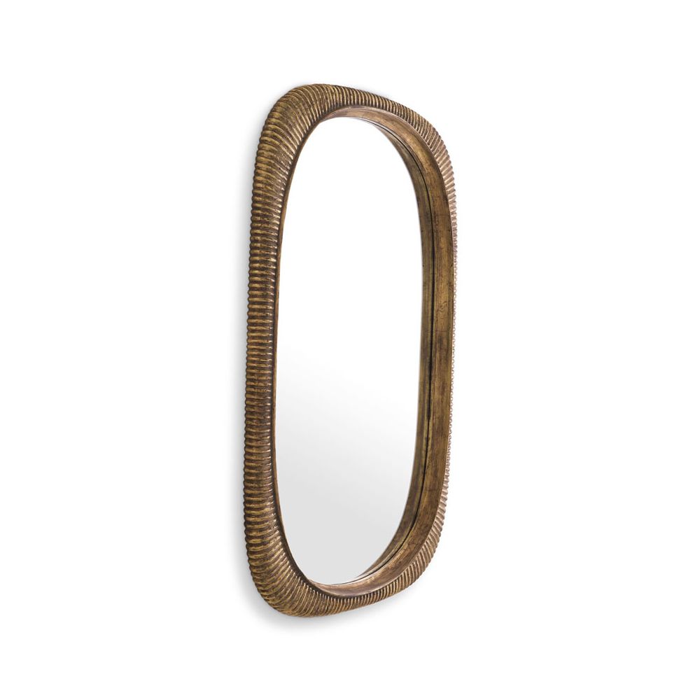 Glamorous wall mirror with antique brass ribbed frame