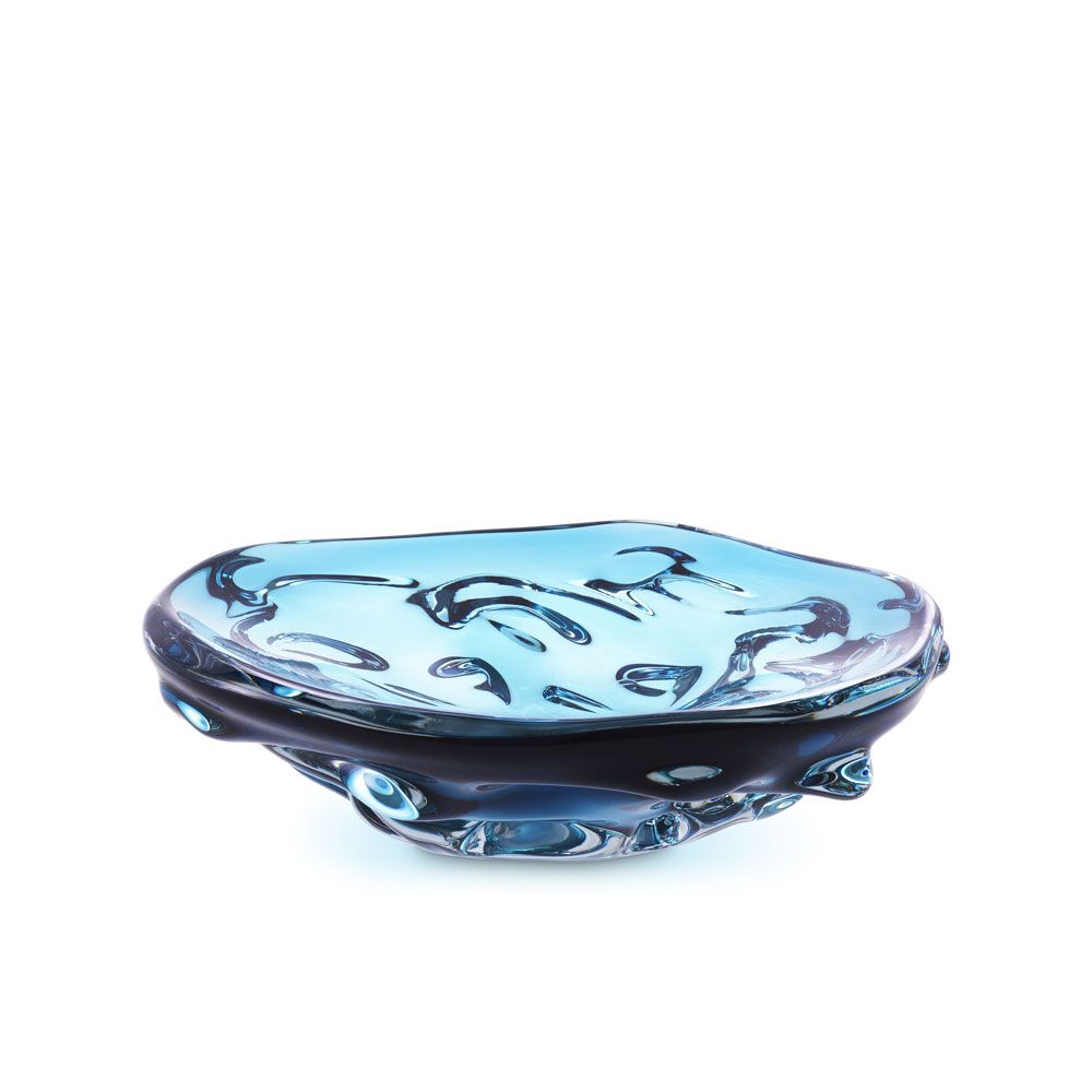 Small blue glass bowl with elegant curves