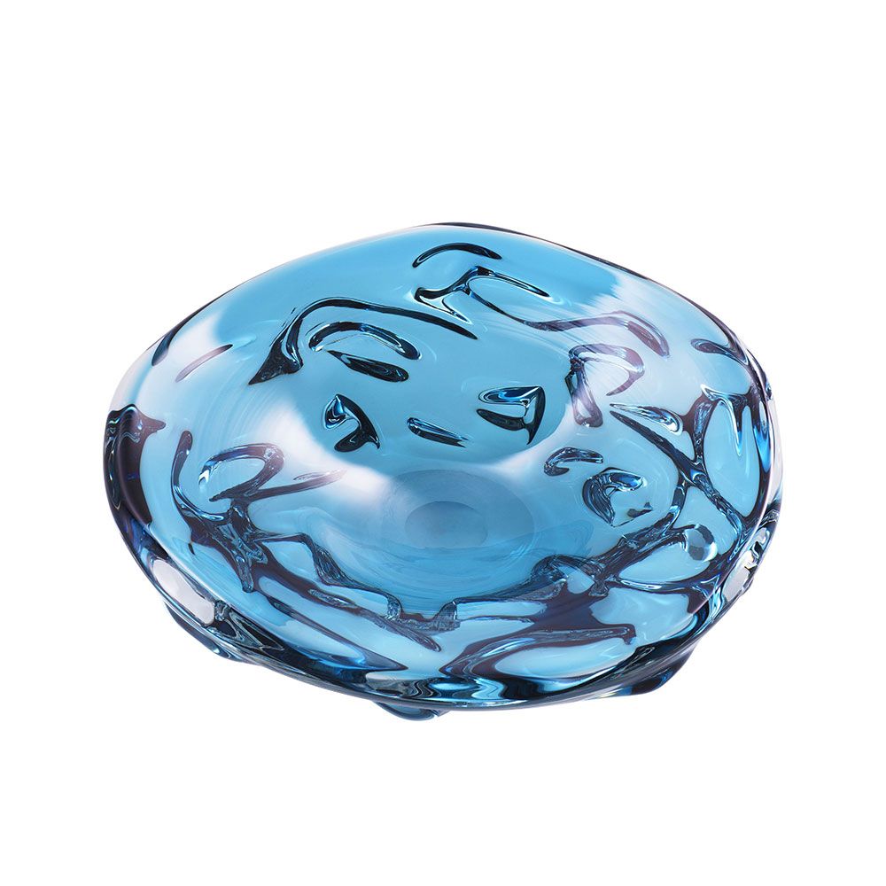Small blue glass bowl with elegant curves