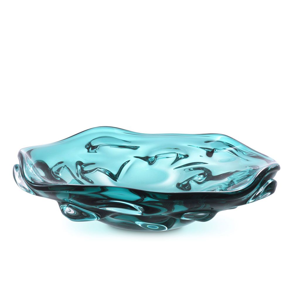Beautiful blue glass bowl featuring an organic, curvaceous design
