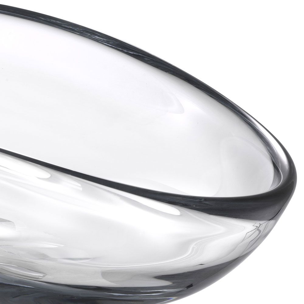 Elegant clear glass bowl featuring enchanting flowing shape
