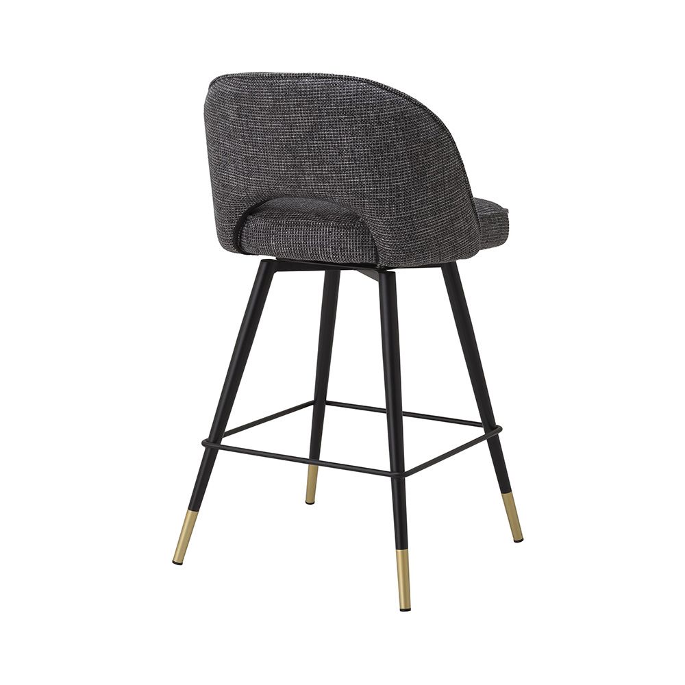 Sleek, rocat black swivel counter stools with elegant brass caps