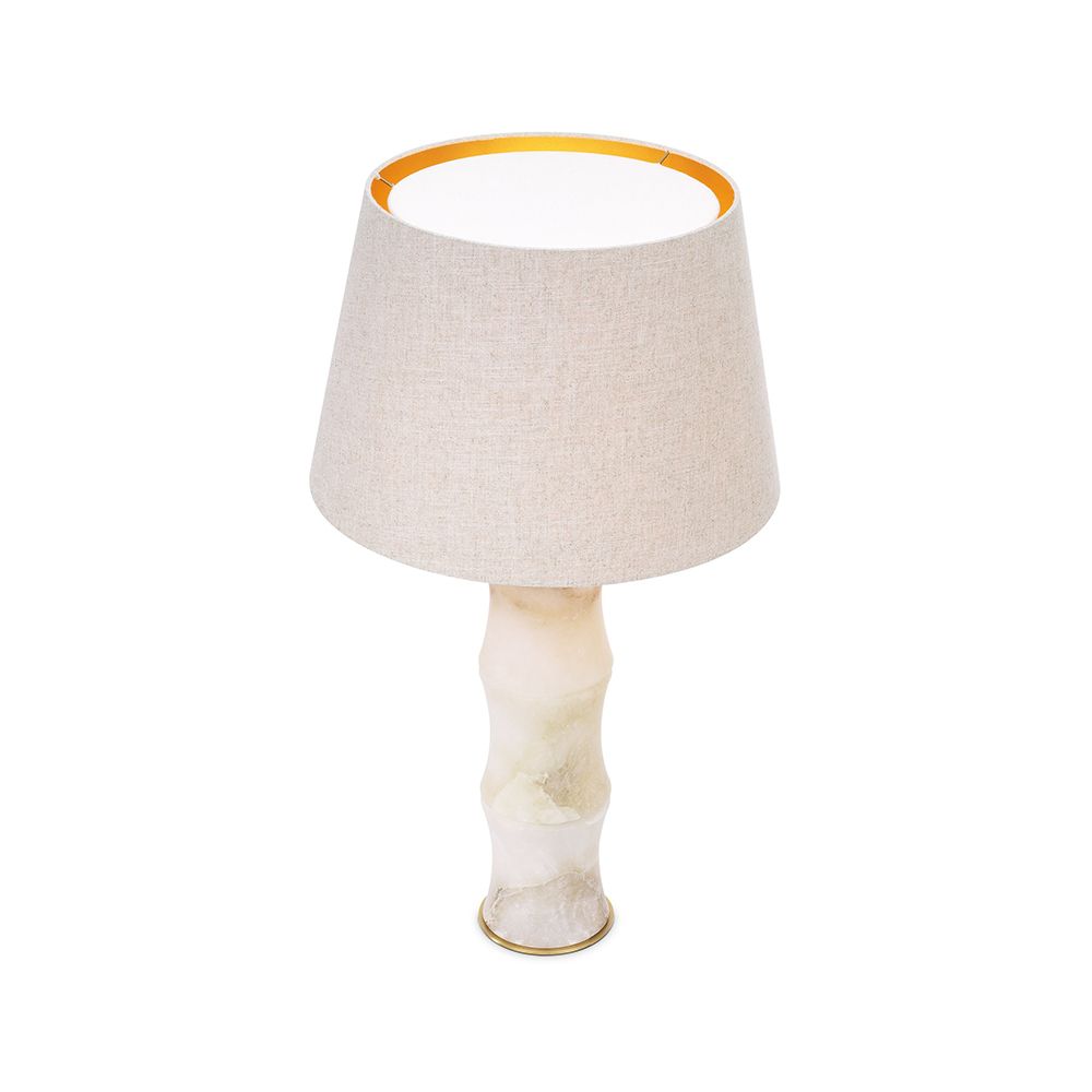 A wonderfully unique side lamp by Eichholtz with a bamboo stem base structured from alabaster and complete with fabric shade