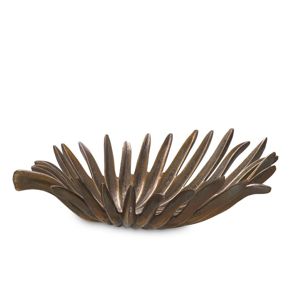 A glamorous tray by Eichholtz with a palm leaf design and vintage brass finish 