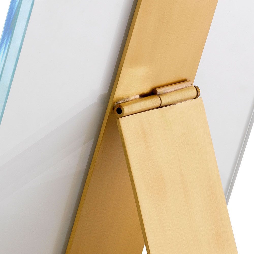 A glamorous, square picture frame by Eichholtz with brass detailing and a clear glass finish