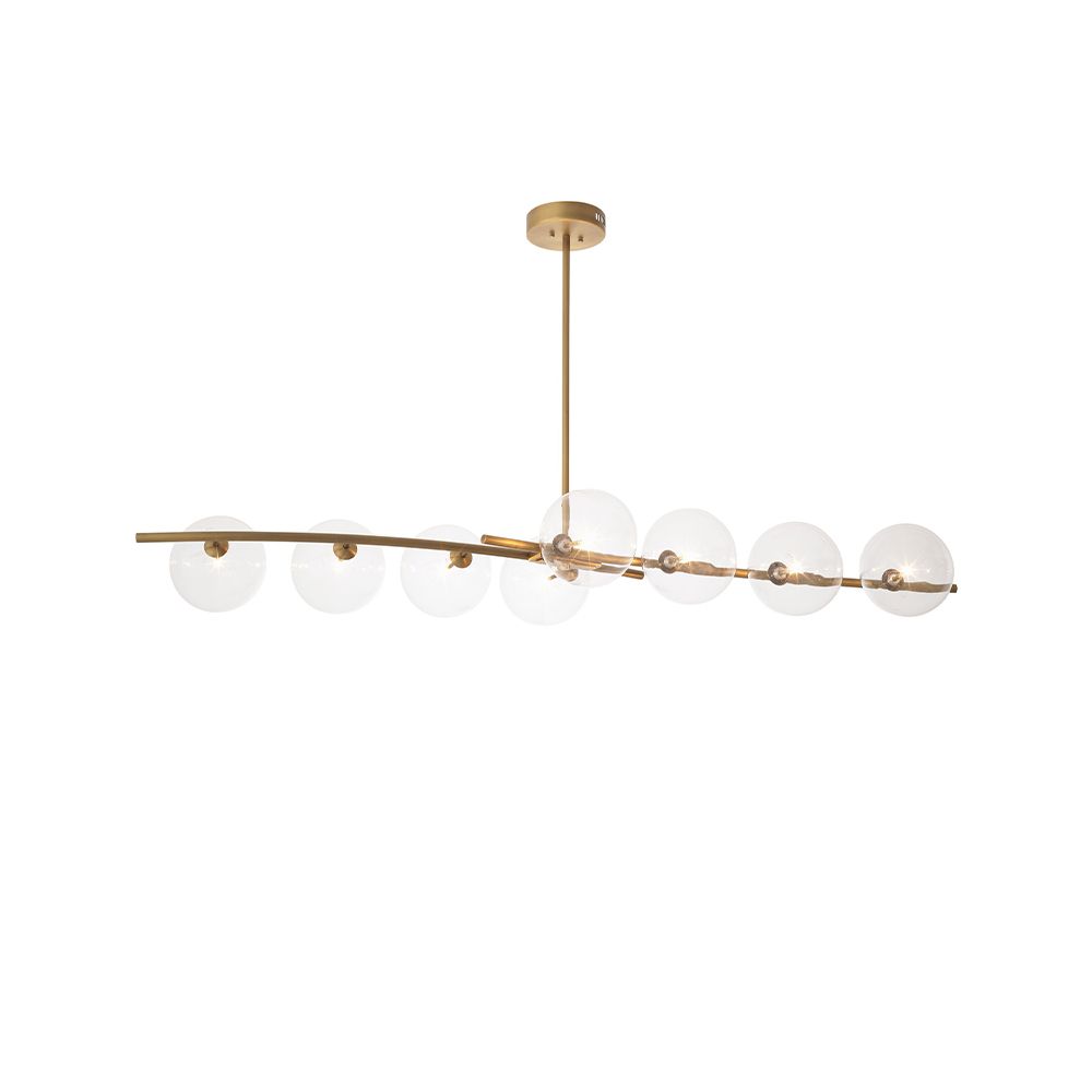 A stylish statement ceiling light by Eichholtz with clear glass spherical shades and an antique brass finish 