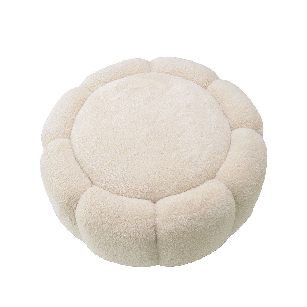 Cosy and stylish ottoman with brushed brass base
