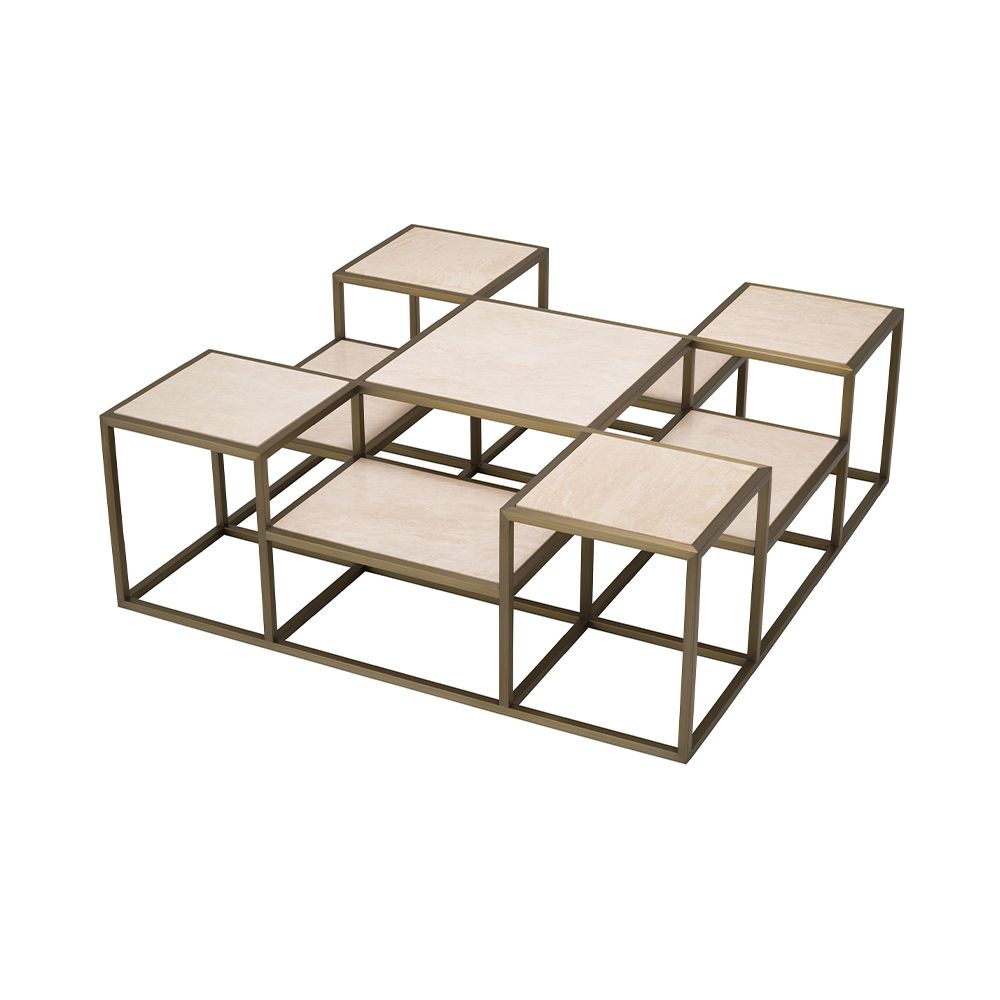 A contemporary coffee table by Eichholtz with a sculptural design featuring a brushed brass finish and travertine table tops