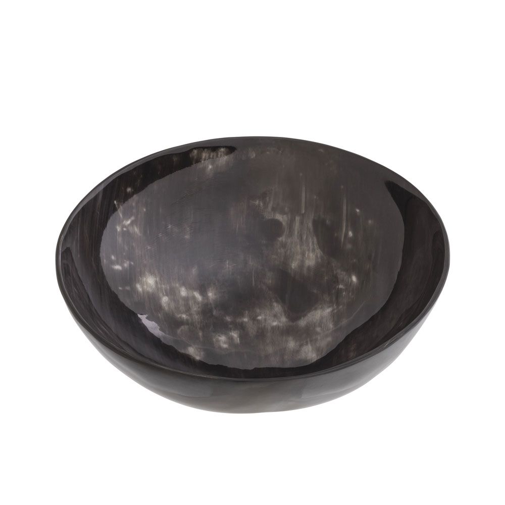 A contemporary black bowl by Eichholtz crafted from dark horn 