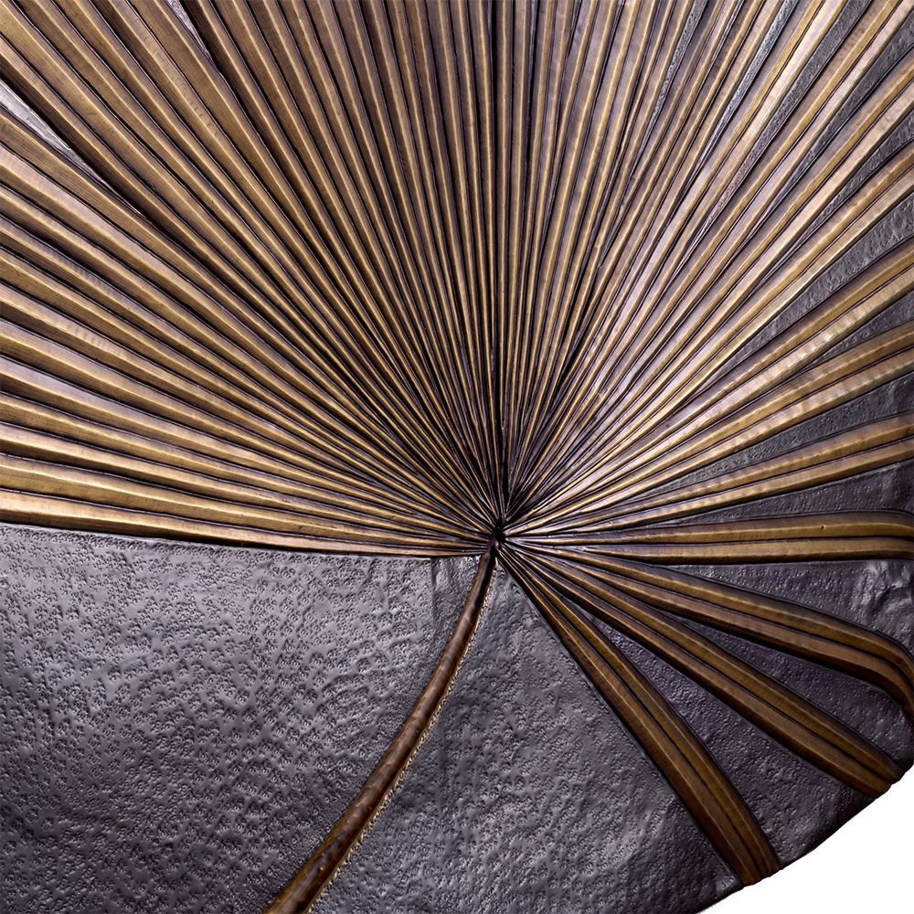 A luxury and ornate wall object by Eichholtz with a palm design