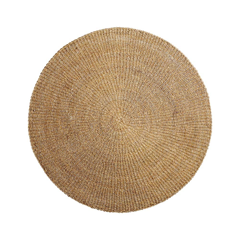 A boho-inspired round rug made from 100% natural seagrass