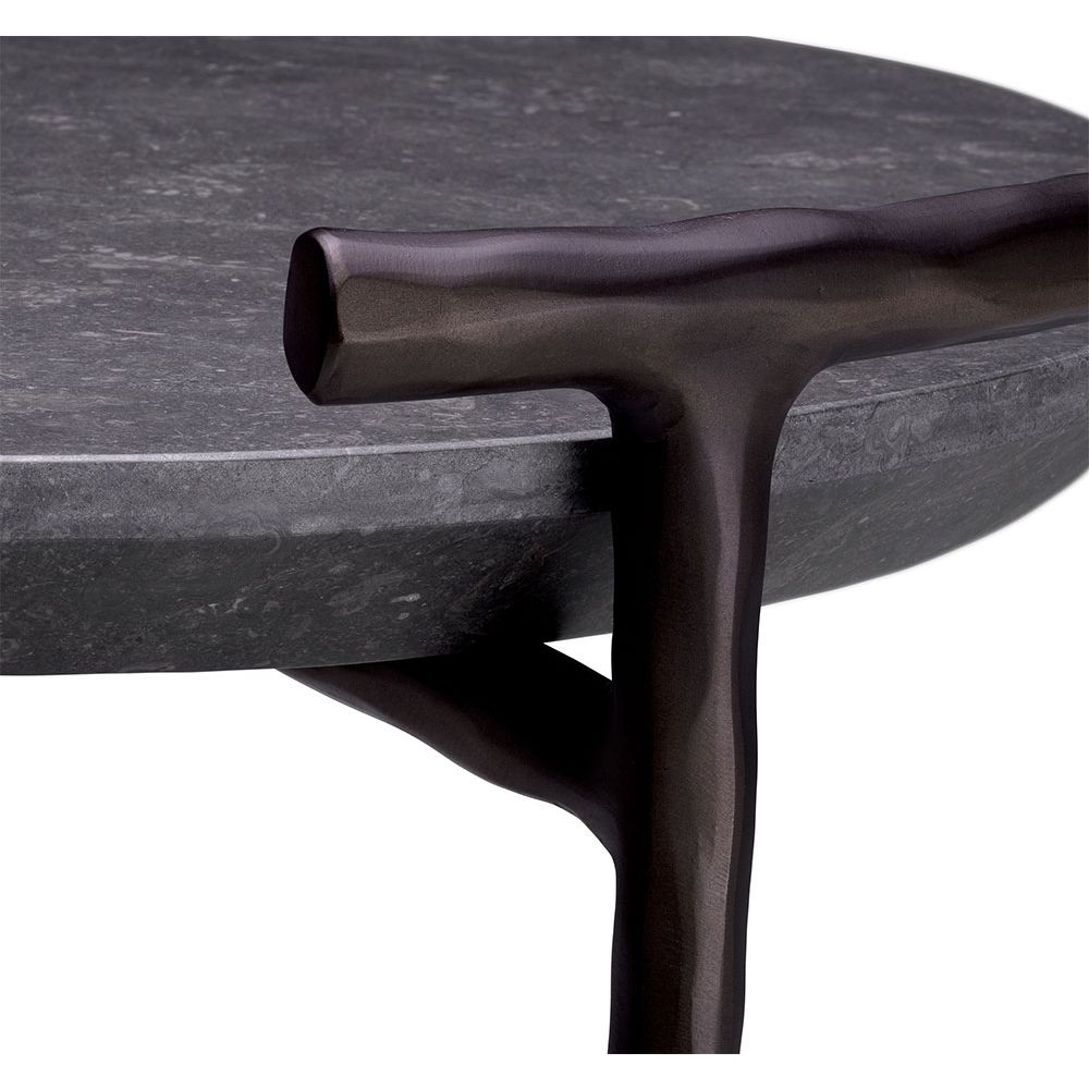 Elegant round side table wit black marble surface and minimal bronze frame