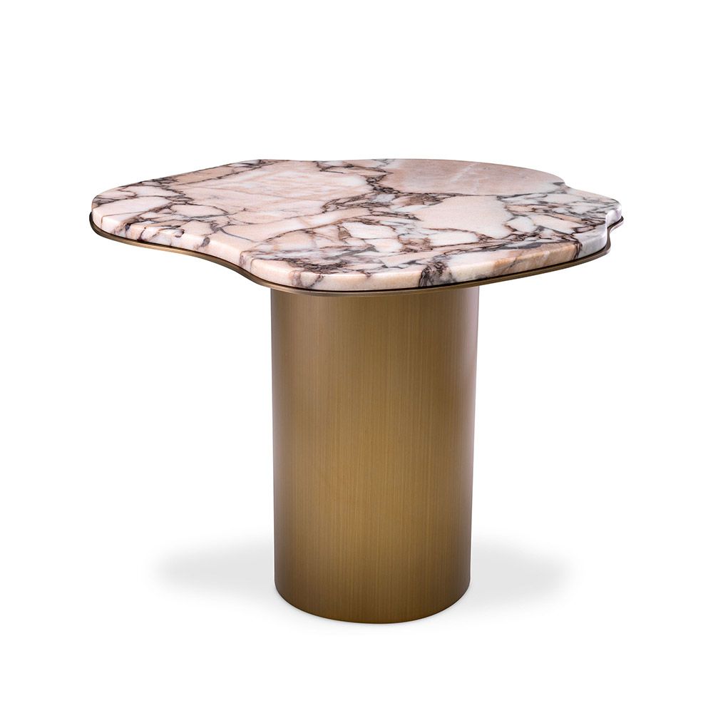 A stainless steel base with a brushed brass finish elegantly supports the asymmetrical marbled top.