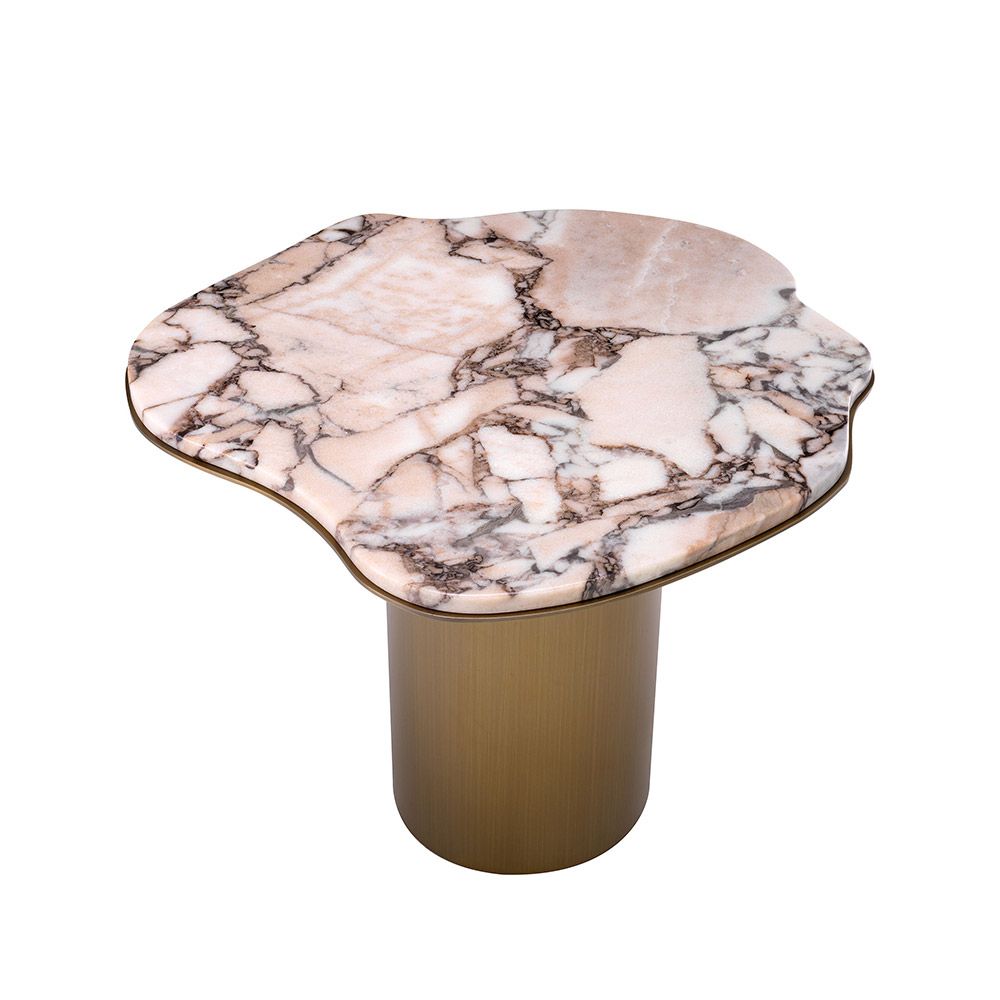 A stainless steel base with a brushed brass finish elegantly supports the asymmetrical marbled top.