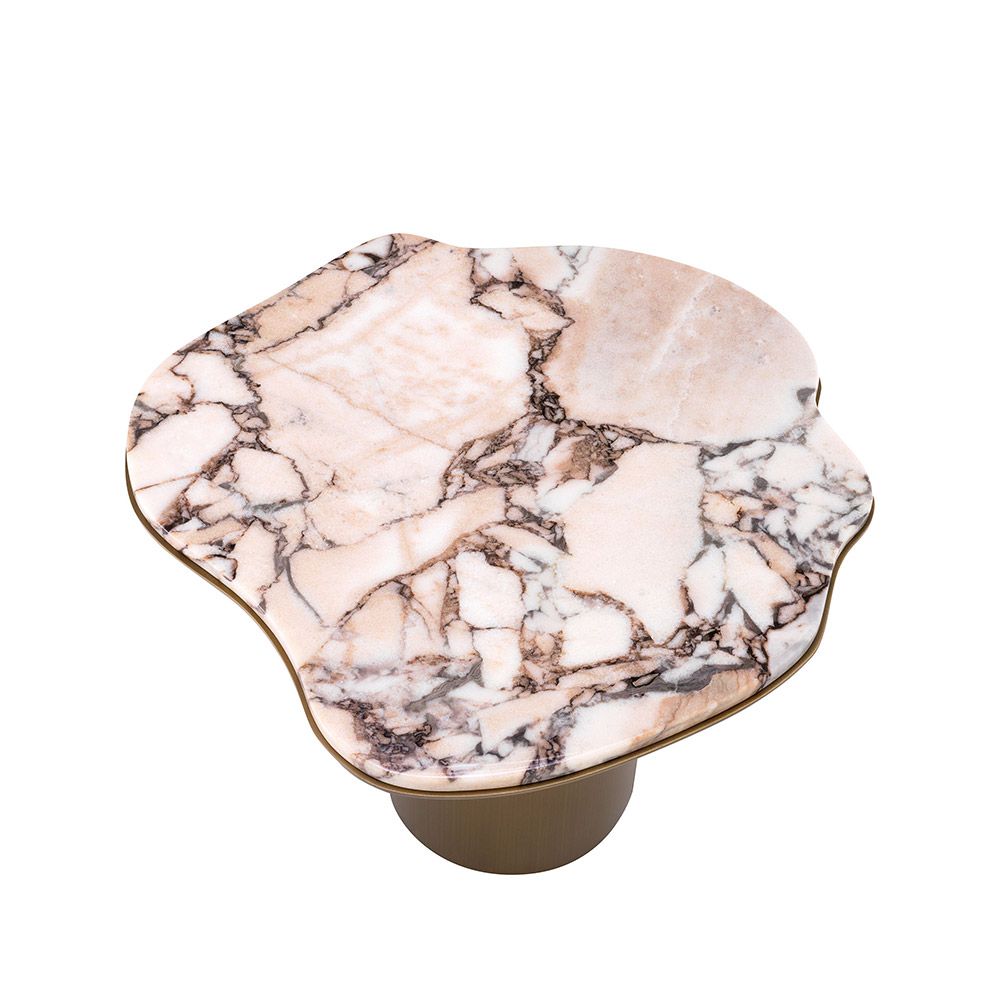 A stainless steel base with a brushed brass finish elegantly supports the asymmetrical marbled top.
