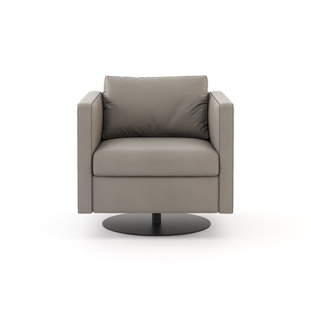 A chic leather armchair with a cushioned backrest and round, iron base