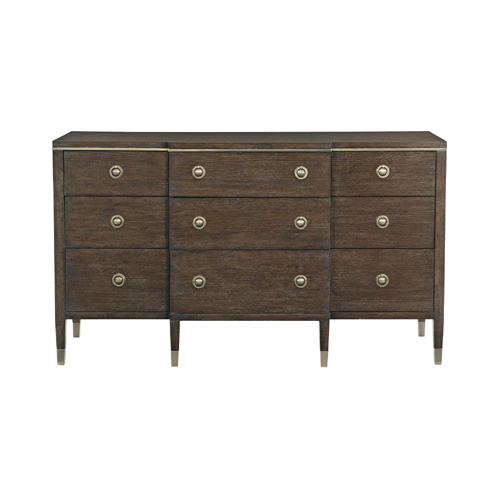 A sophisticated dresser from Bernhardt with a burnished brass and white oak veneer finish, six legs and nine drawers