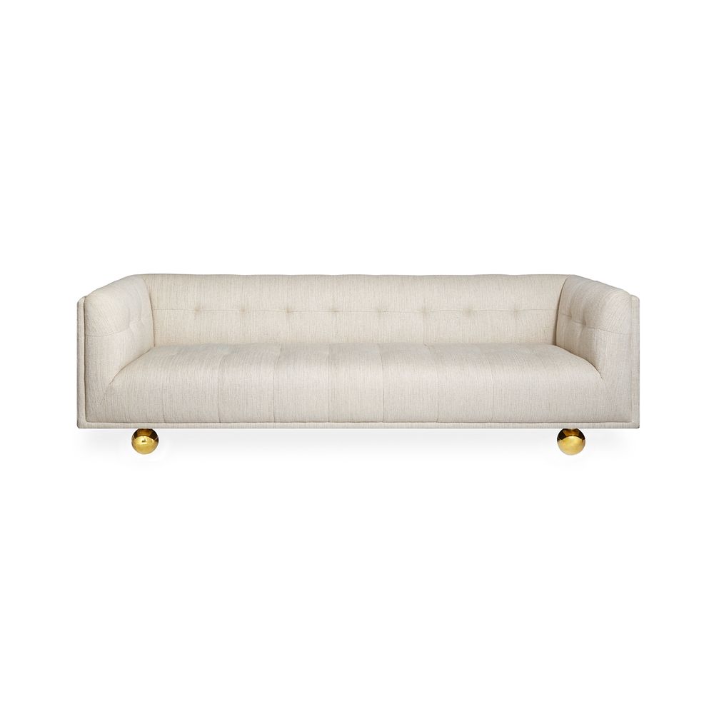 stylish, contemporary sofa with rounded feet and stone-coloured fabric 