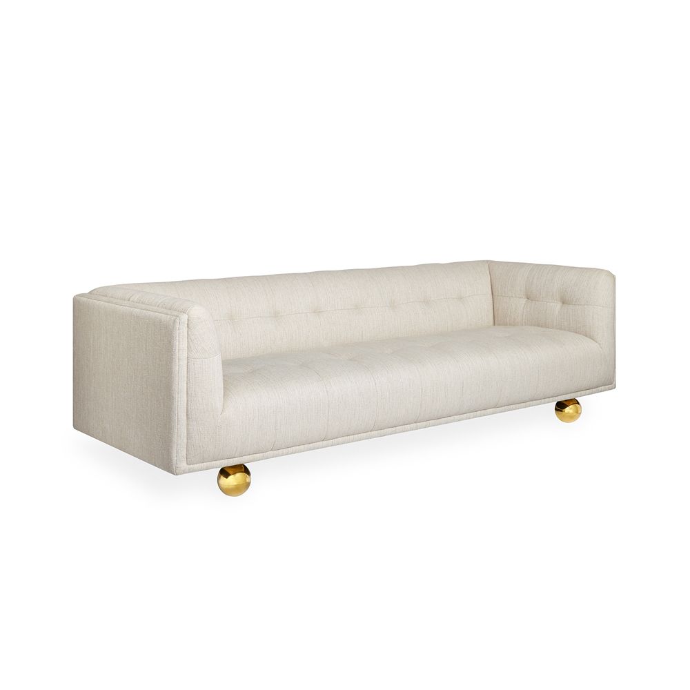 stylish, contemporary sofa with rounded feet and stone-coloured fabric 