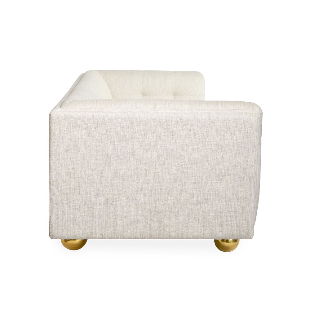 stylish, contemporary sofa with rounded feet and stone-coloured fabric 