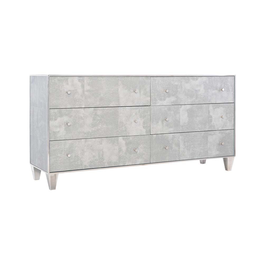 A luxurious, faux vellum chest of drawers with six drawers