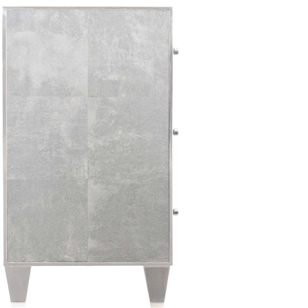 A luxurious, faux vellum chest of drawers with six drawers