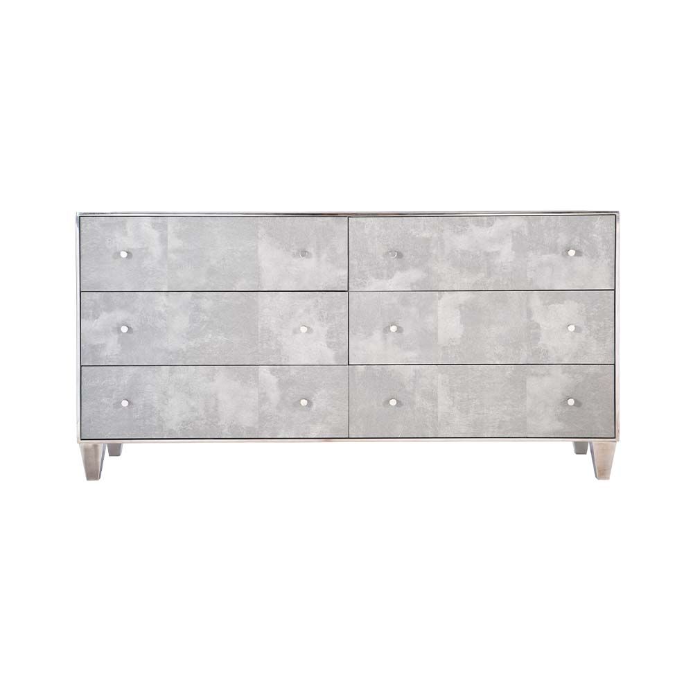 A luxurious, faux vellum chest of drawers with six drawers