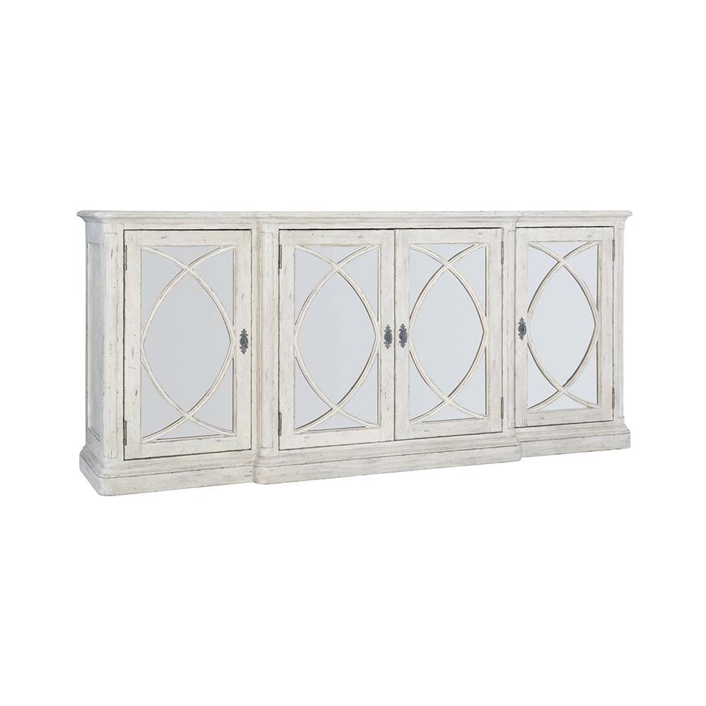 Elegant, distressed sideboard with decorated panel doors.