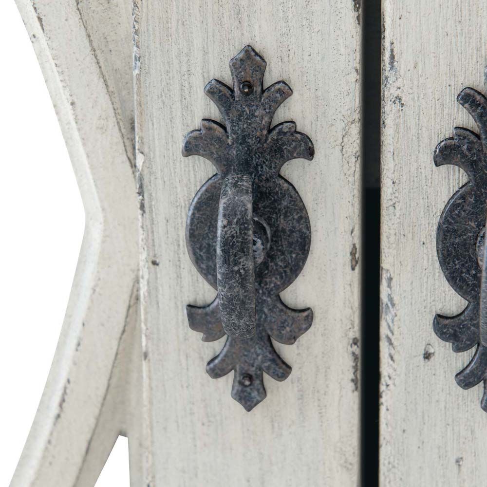 Elegant, distressed sideboard with decorated panel doors.