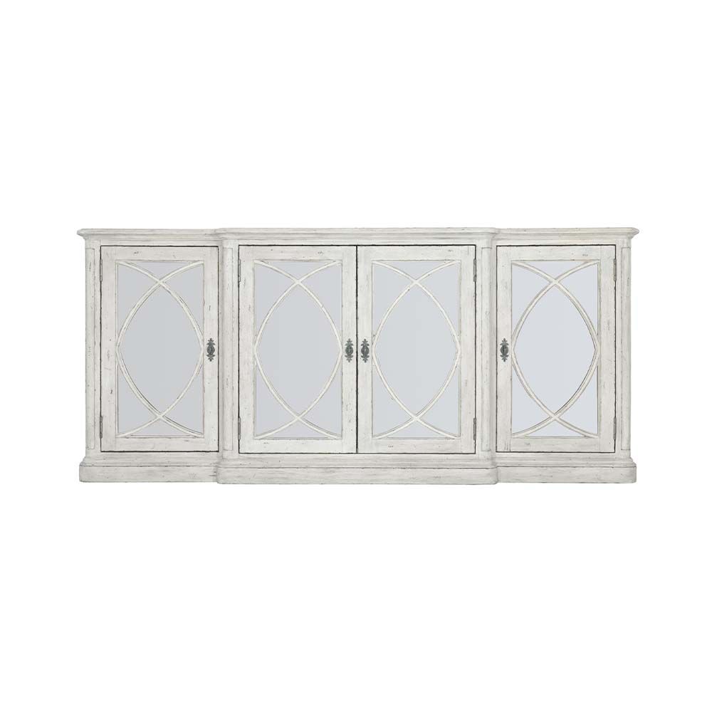Elegant, distressed sideboard with decorated panel doors.