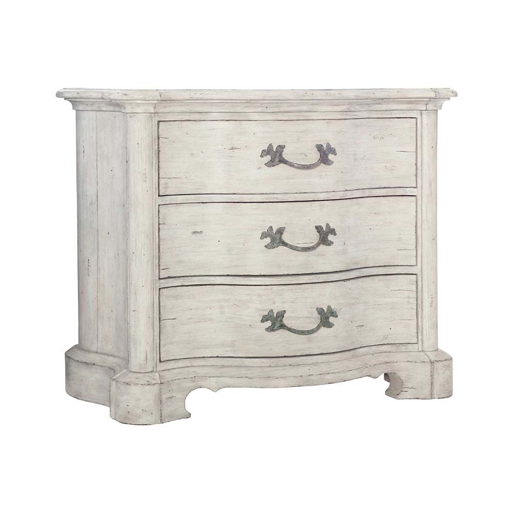 Timeless bedside table with three drawers.