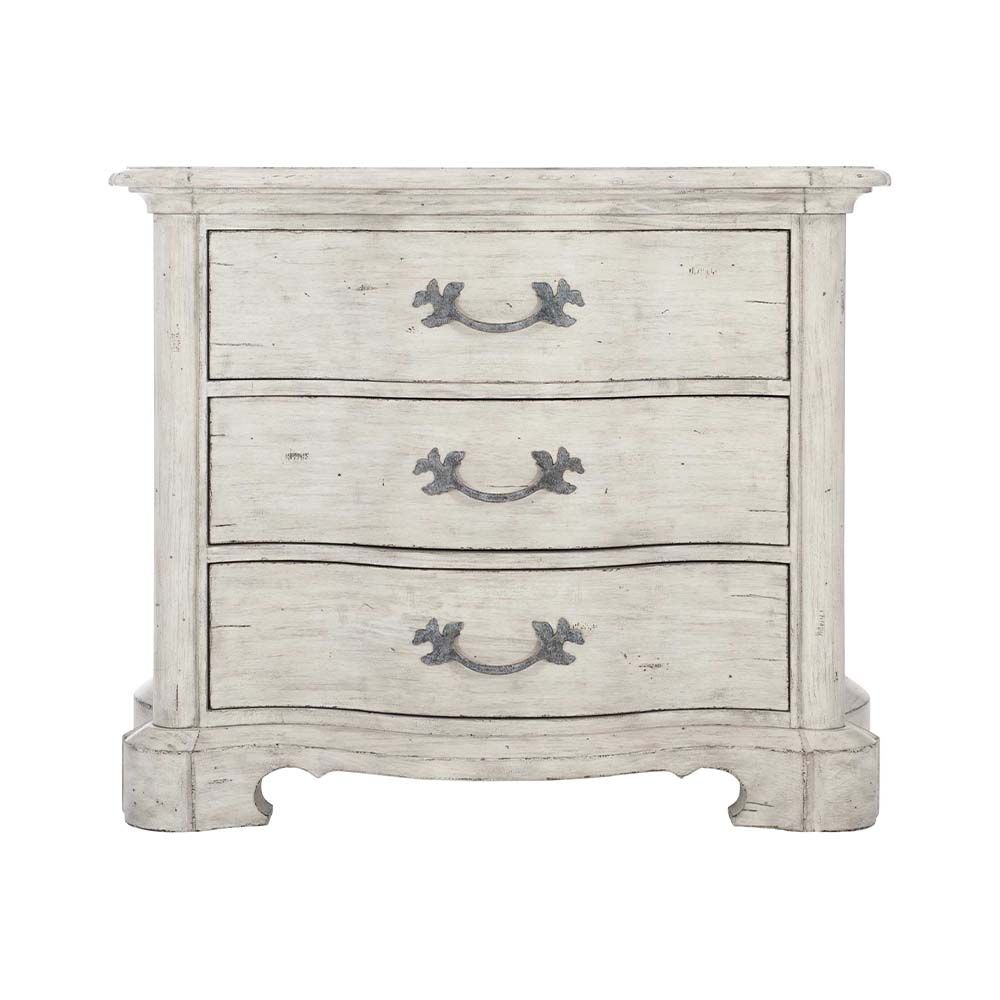 Timeless bedside table with three drawers.