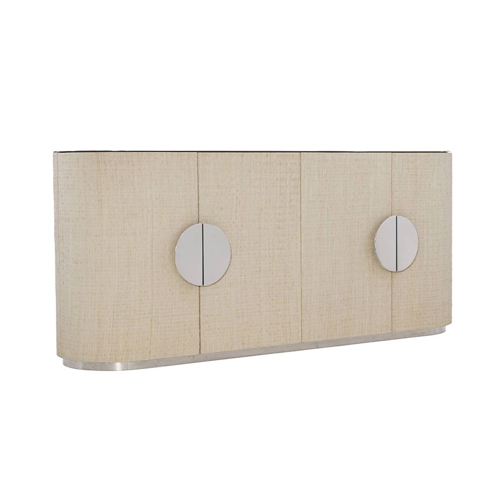A stunning bleached raffia sideboard with four doors, interior shelving, a white oak veneer interior, polished stainless steel top and plinth base