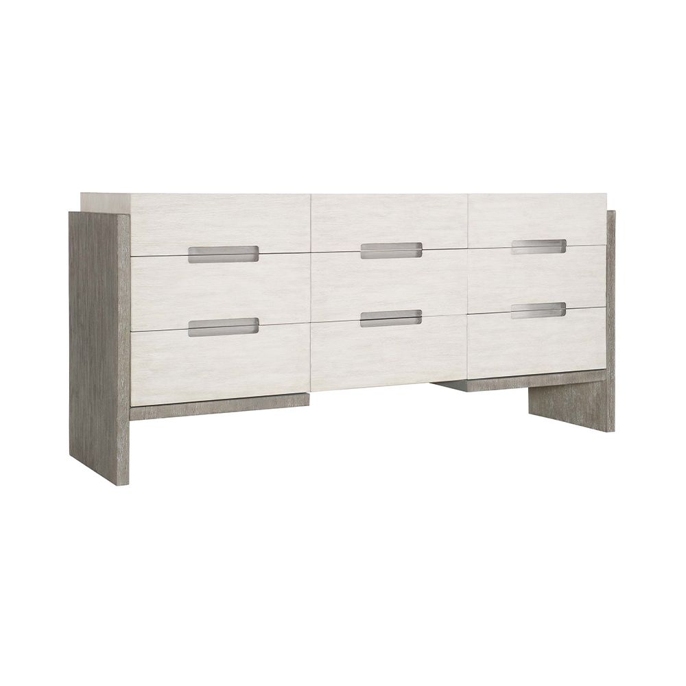 A sophisticated dresser from Bernhardt with a two toned white and grey finish, brushed stainless steel handles and nine soft closing drawers