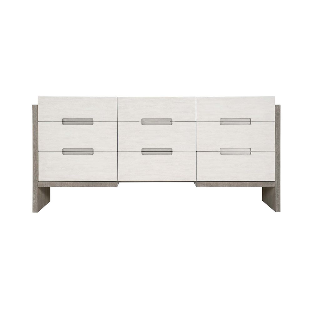 A sophisticated dresser from Bernhardt with a two toned white and grey finish, brushed stainless steel handles and nine soft closing drawers