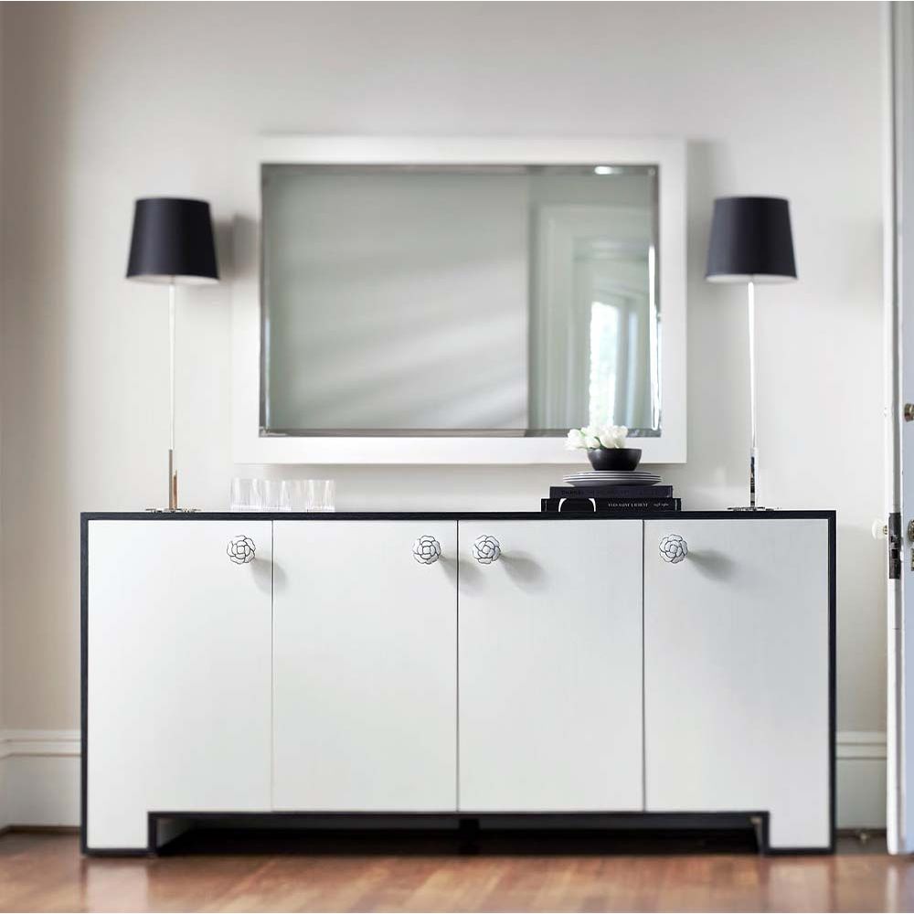 Monochromatic sideboard with four doors and rose detail handles