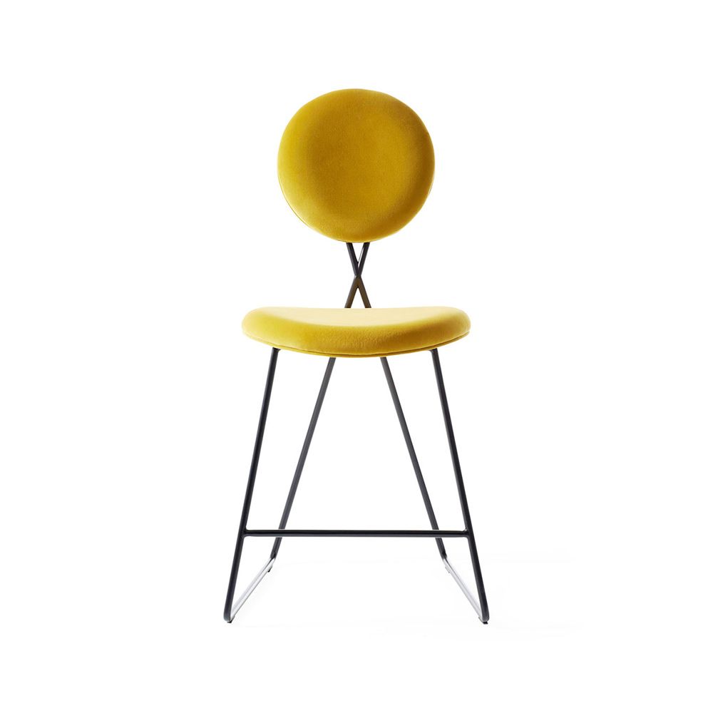 Chic counter stool in vibrant yellow finish with black metal frame