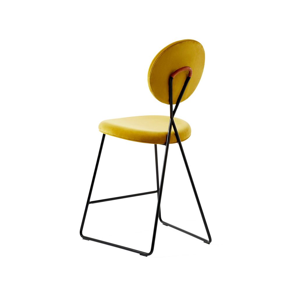 Chic counter stool in vibrant yellow finish with black metal frame