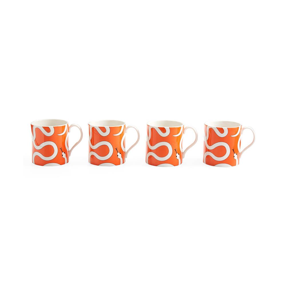 Vibrant orange mugs with intricate snake illustration