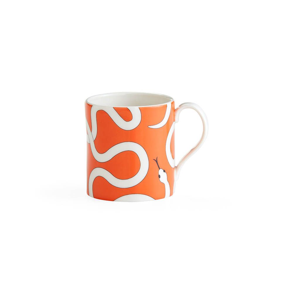 Vibrant orange mugs with intricate snake illustration