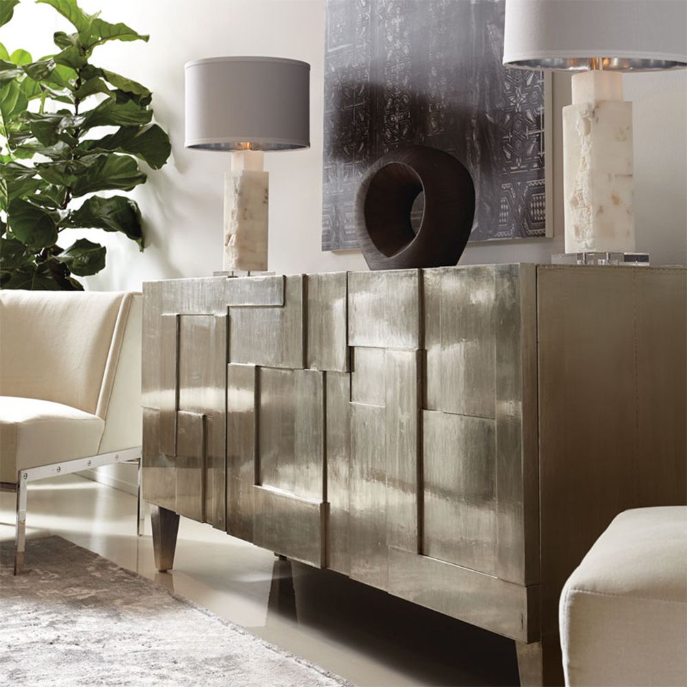 A decorative three door entertainment unit with a unique design, silver finish and internal storage