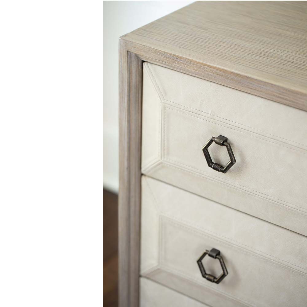 Upholstered, contrasting dresser with 8 drawers