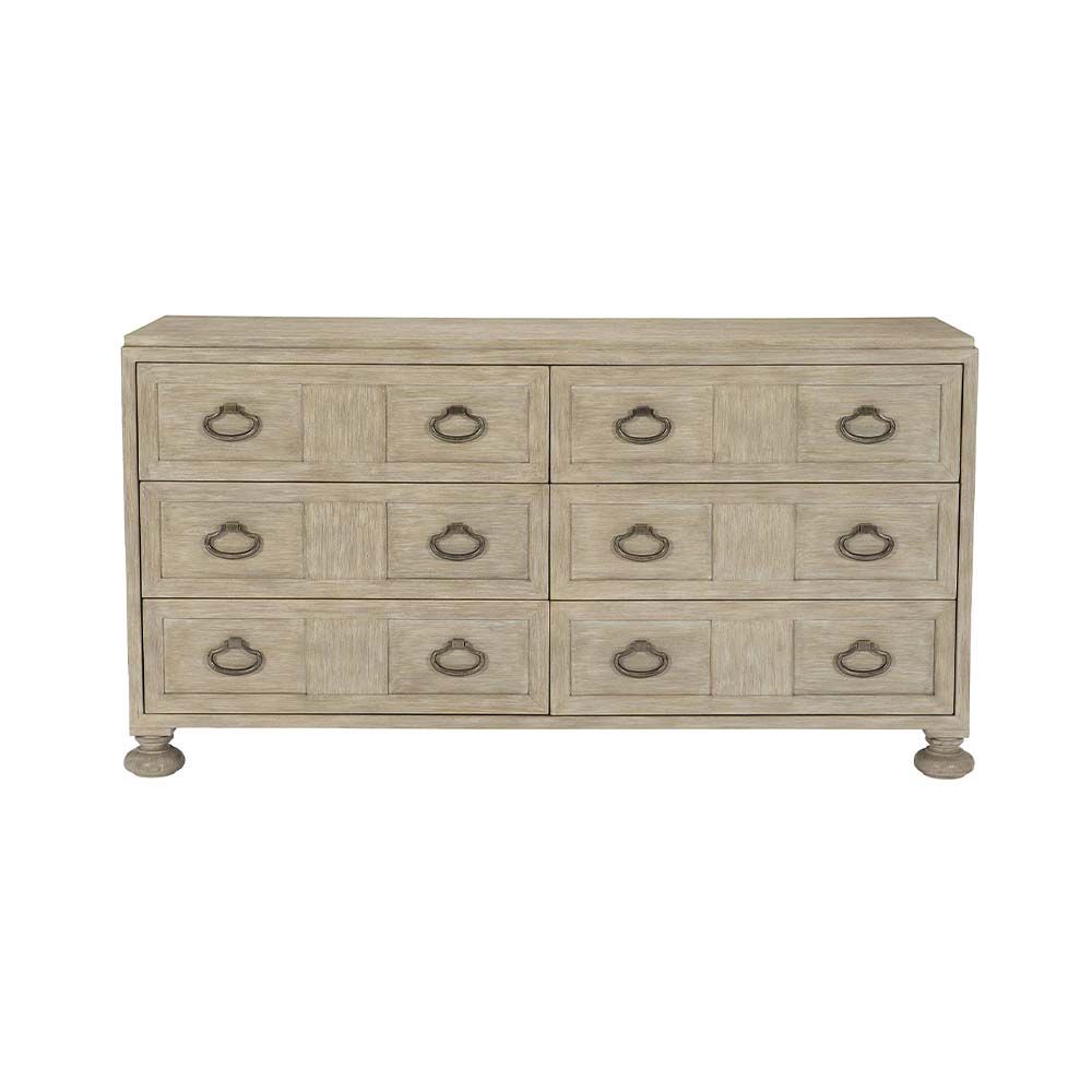 A six drawer dresser with subtle carvings within the front panels.