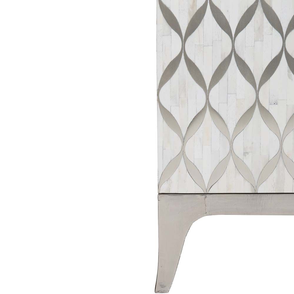 An opulent sideboard with silver inlaid pattern
