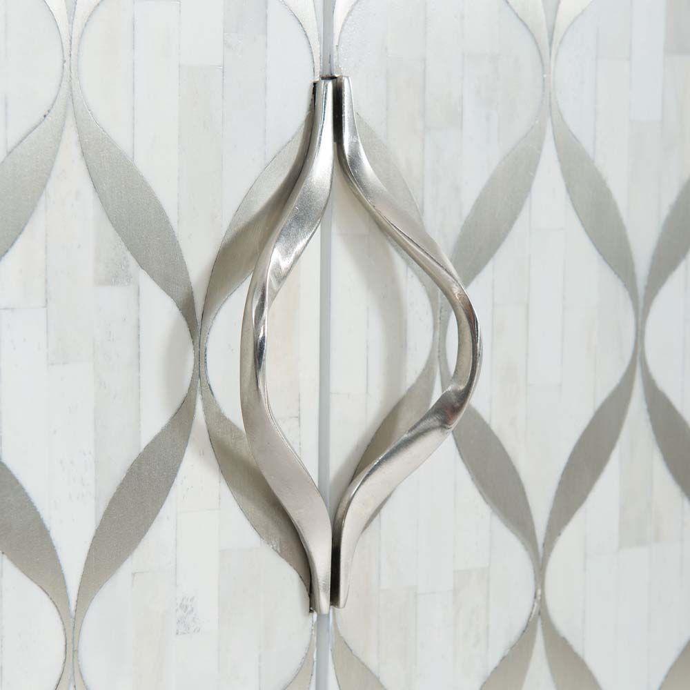 An opulent sideboard with silver inlaid pattern