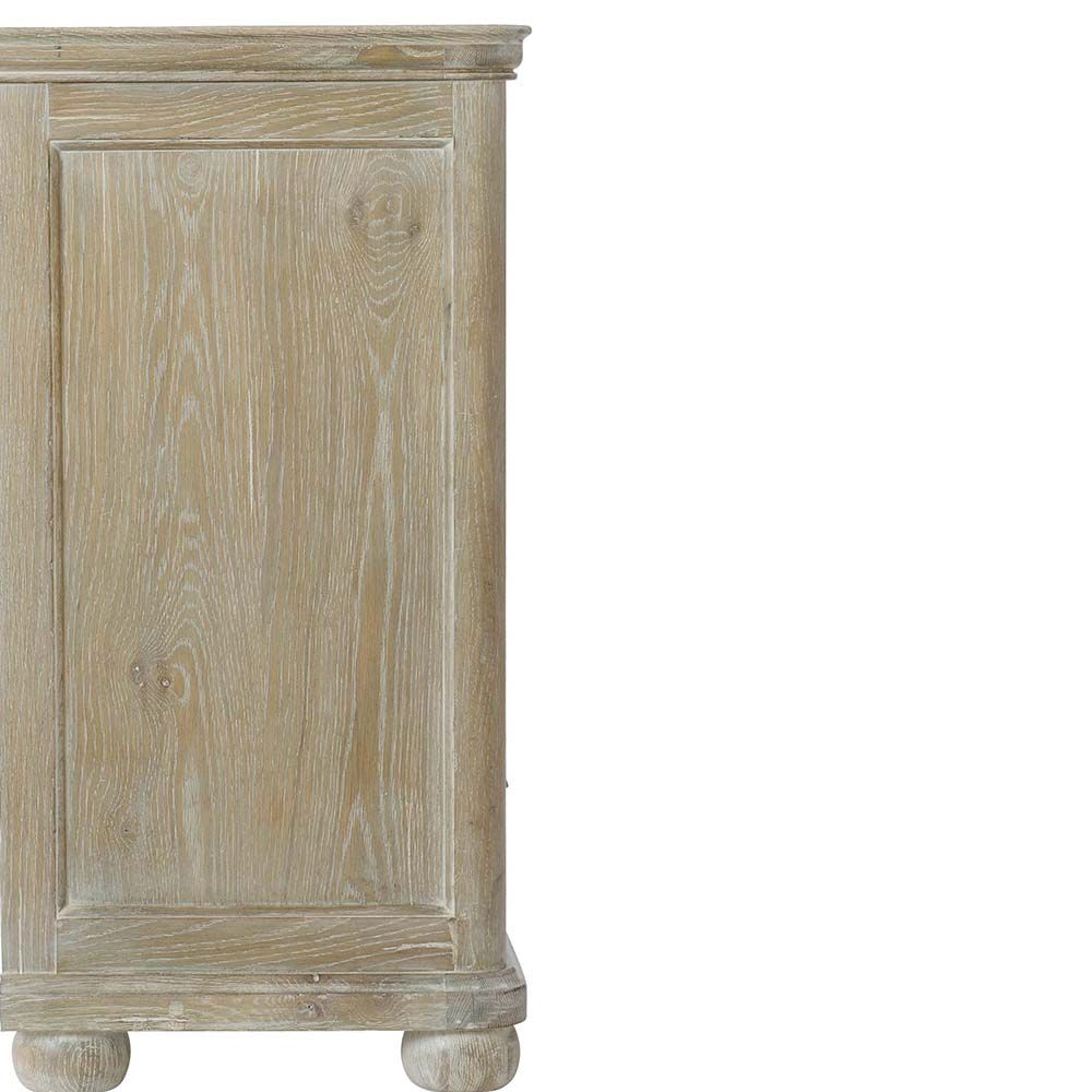 An 8-drawer dresser in a luxurious, natural finish that's perfect for rustic and chic spaces