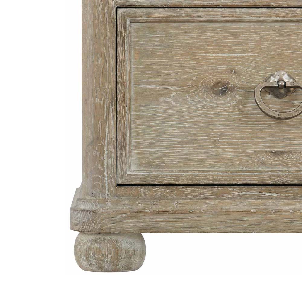 An 8-drawer dresser in a luxurious, natural finish that's perfect for rustic and chic spaces